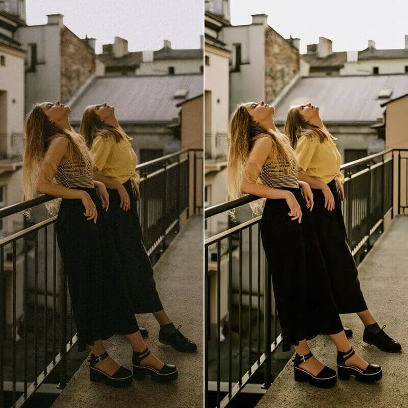 Woman wearing a black skirt and yellow shirt a balcony overlooking the city