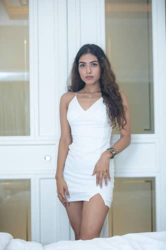 change clothes - girl in white dress before