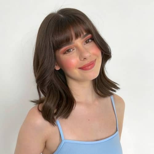 bangs filter - brunette girl in blue top after
