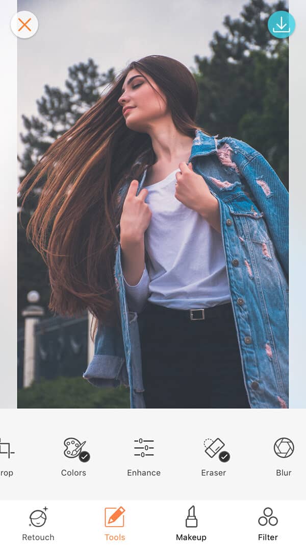 A picture of a brunette being edited by AirBrush