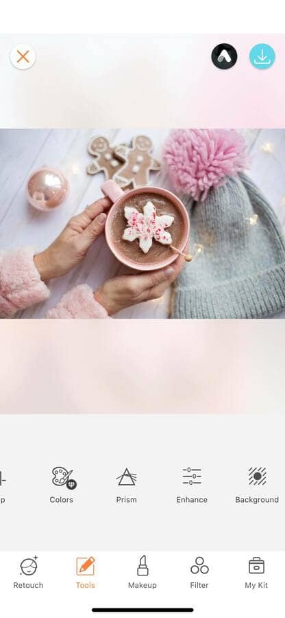 pink Christmas flat lay with snowflake cookie and grey and pink hat