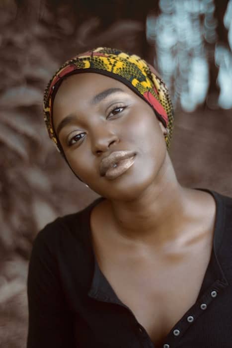 African woman with glittery lipstick