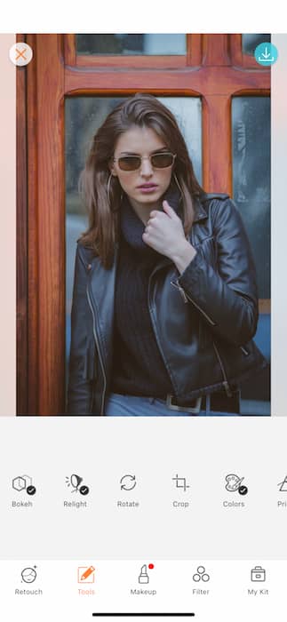 woman wearing black leather jacket and sunglasses