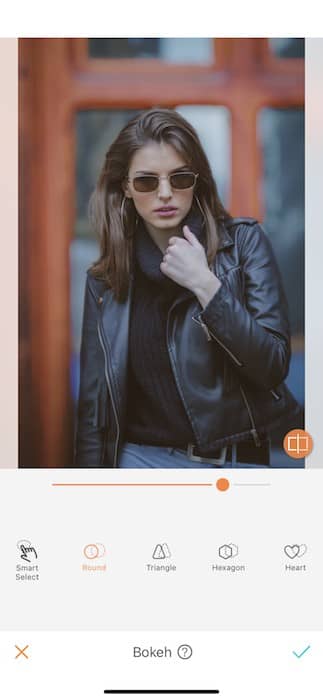 woman wearing black leather jacket and sunglasses