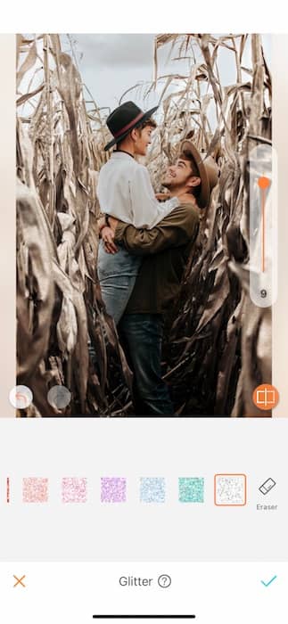 smiling couple embracing in a corn field