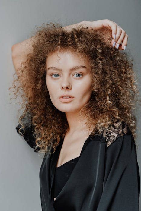 picture white woman with curly hair