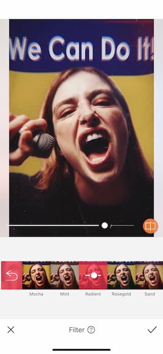 woman screaming into a microphone