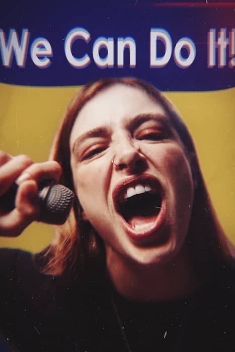 woman screaming into a microphone