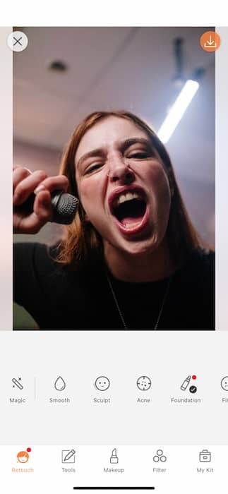 woman screaming into a microphone