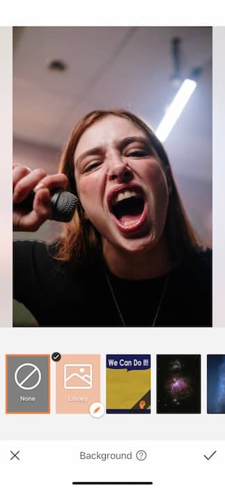 woman screaming into a microphone