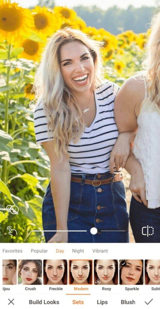 smiling woman in a sunflower field