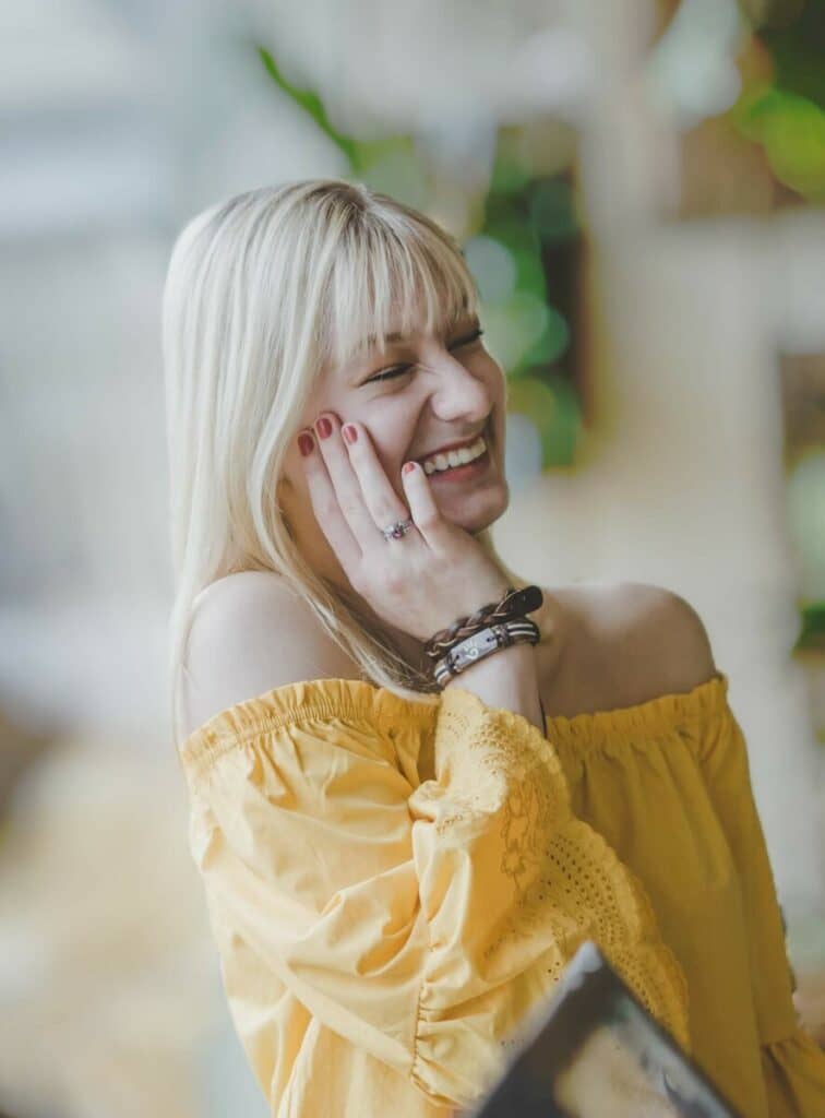 Cancer edit with woman in yellow top laughing