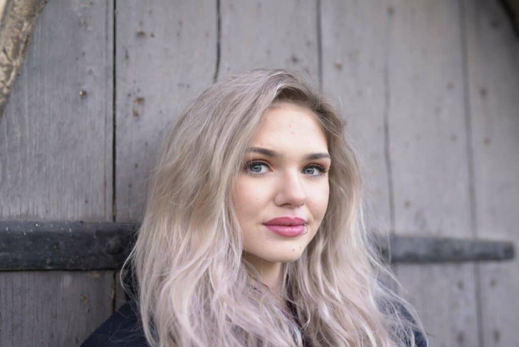 smiling woman with light blonde hair