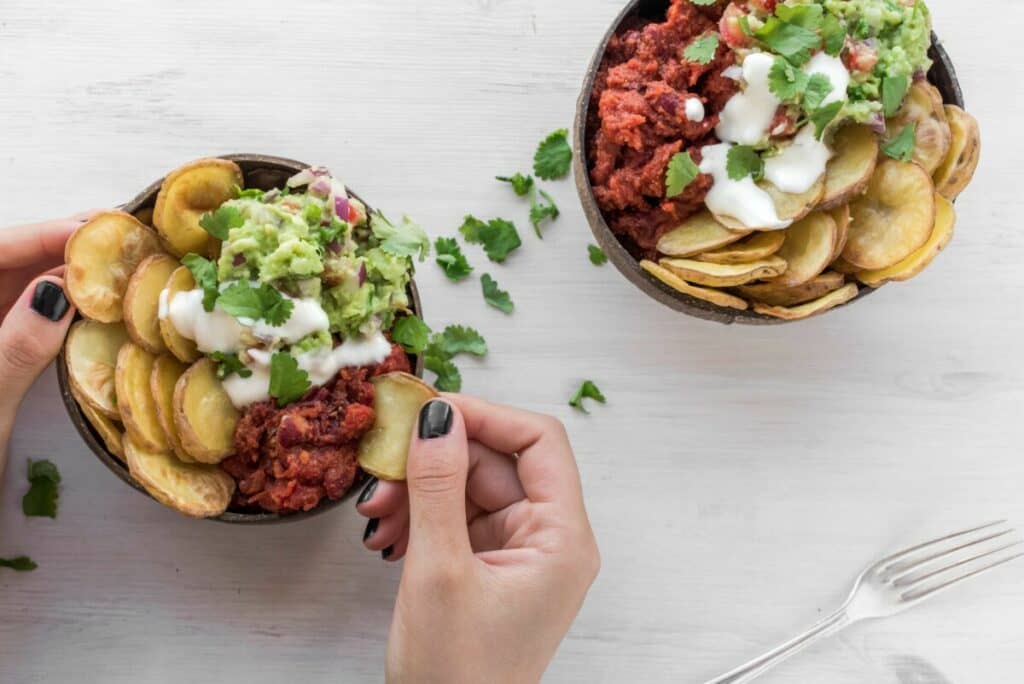 potato chips with guacamole and sour cream