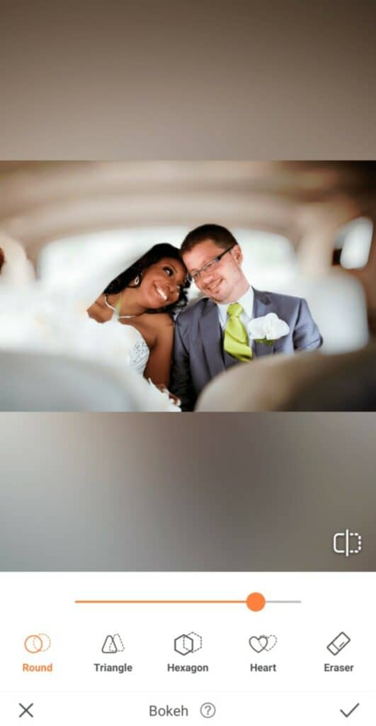 married couple sitting in a car