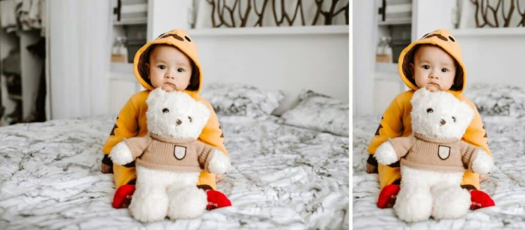 toddler sitting on a bed in a chicken costume