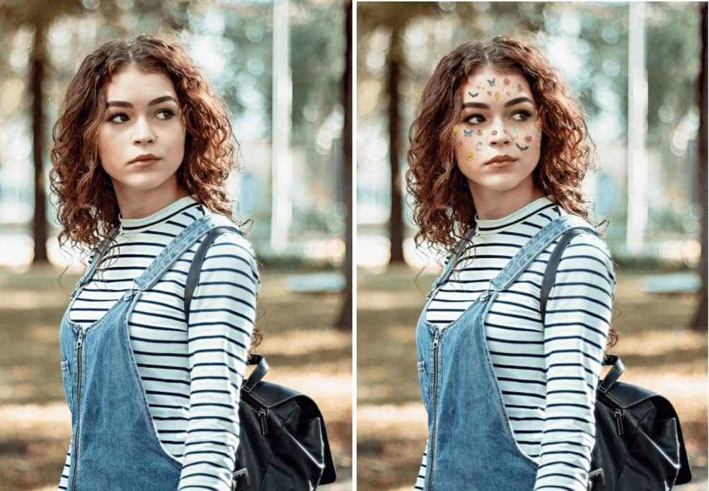 woman wearing overalls and a striped shirt with stickers on her face