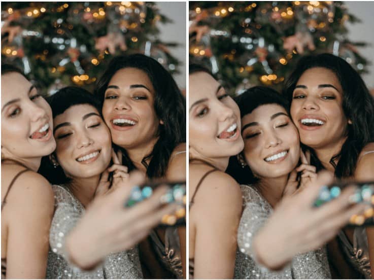 three women in front of christmas tree