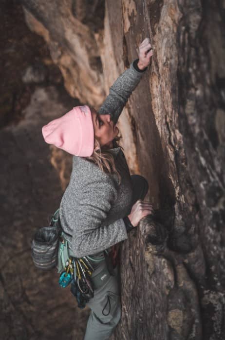 woman rock climbing