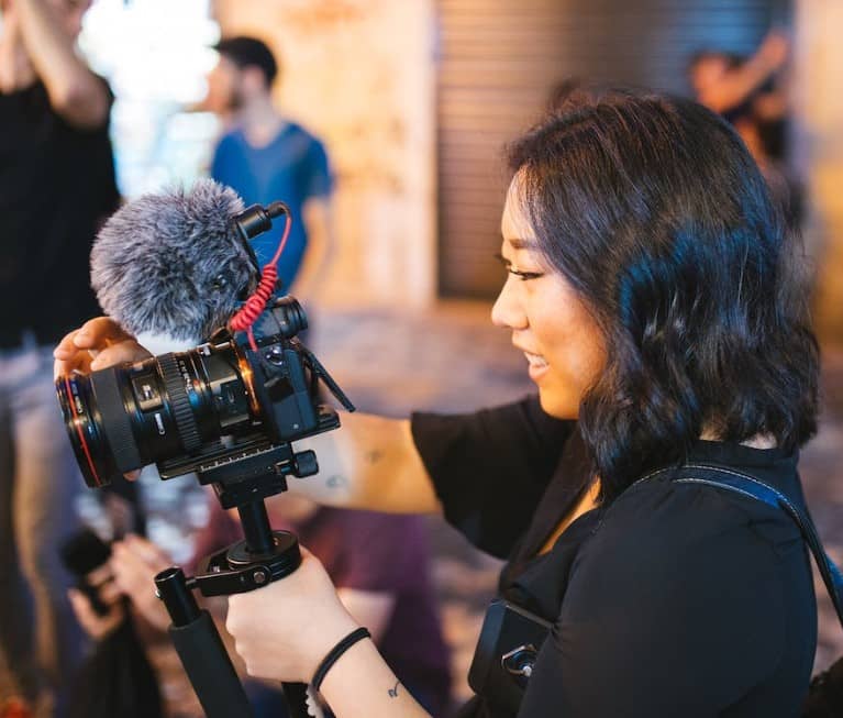 woman holding camera